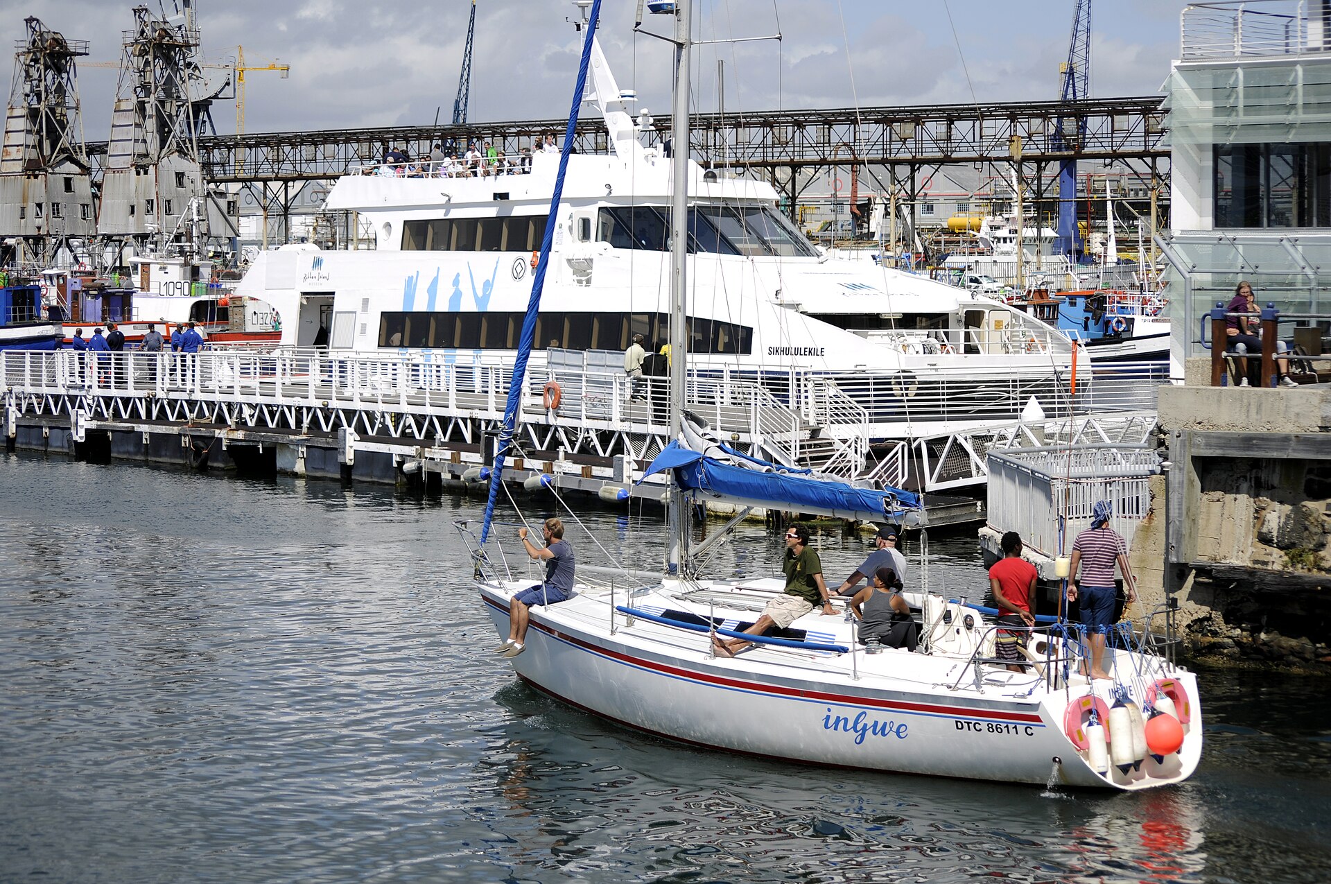 Friends on a sailing boat at the V&A Waterfront in Cape Town.